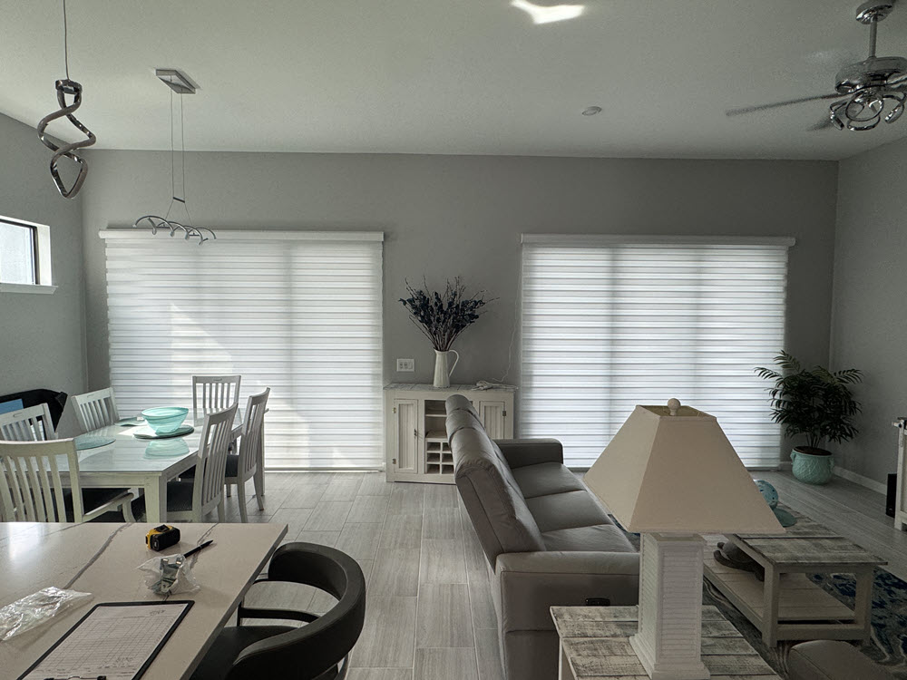 Banded shutters installed in living room of Nokomis home Banded shutters installed in living room of Nokomis home