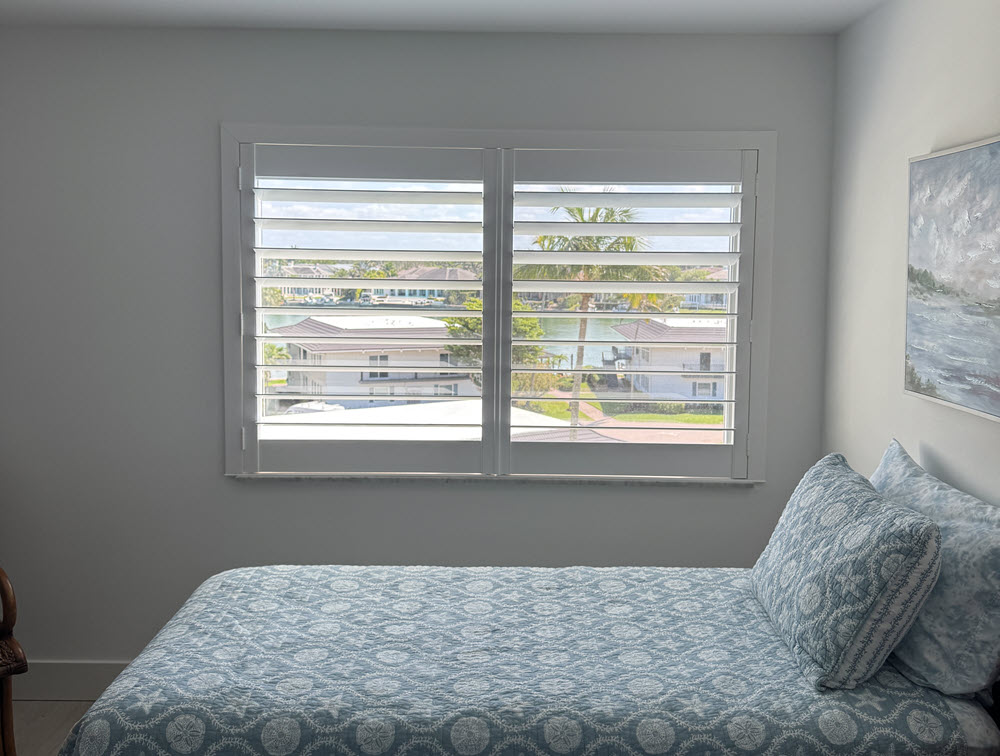 Plantation shutters installed in bedroom of Sanibel Island home Plantation shutters installed in bedroom of Sanibel Island home
